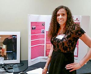 female student presenting research results